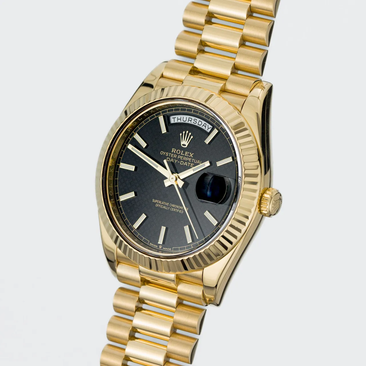 Rolex Day-Date 40 diagonal view showing the champagne dial texture